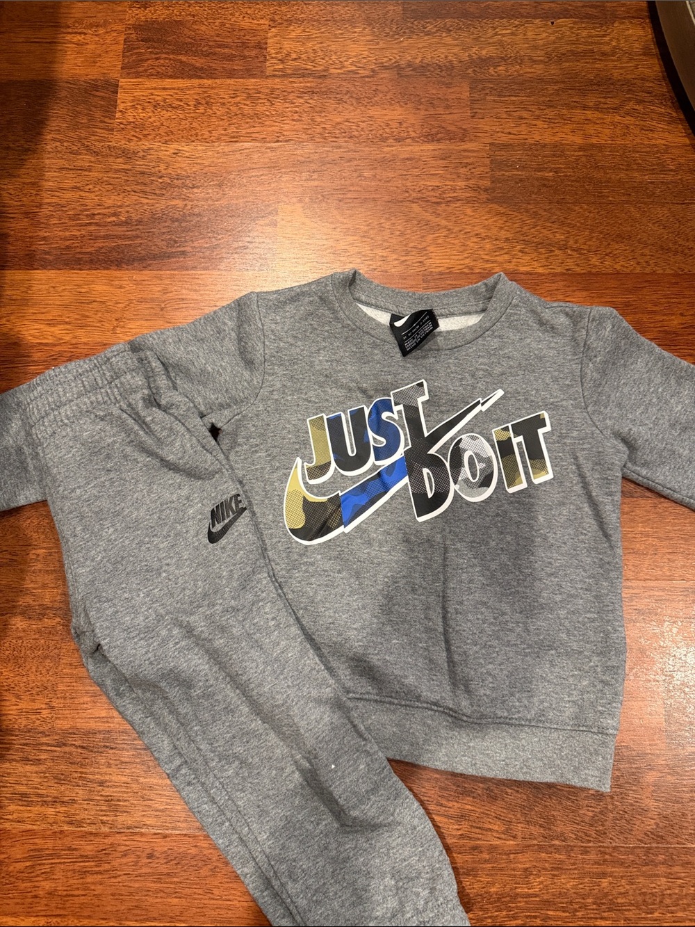 Nike Gray Kids Sweatpants with 'Just Do It' Graphic